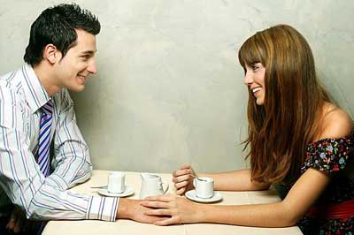 Couple talking and smiling, emotional connection